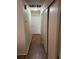 Hallway featuring wood-look tile flooring and convenient closet space at 2362 Sierra Sunrise St, Las Vegas, NV 89156