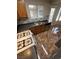 This kitchen is equipped with stainless steel appliances and a double sink, and features tile backsplash at 2362 Sierra Sunrise St, Las Vegas, NV 89156
