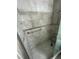 Tiled shower stall features a hand rail and neutral colored tiles at 2362 Sierra Sunrise St, Las Vegas, NV 89156