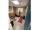 Workout room featuring a window, tile flooring and multiple pieces of exercise equipment at 2362 Sierra Sunrise St, Las Vegas, NV 89156