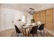 Elegant dining room featuring modern lighting and stylish furnishings at 2561 Terrytown Ave, Henderson, NV 89052