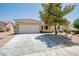 Charming single-story home featuring a well-manicured front yard at 2561 Terrytown Ave, Henderson, NV 89052