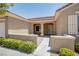 Inviting front porch with charming architectural details and manicured landscaping at 2561 Terrytown Ave, Henderson, NV 89052