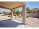 Covered patio offers backyard views of xeriscape and lush desert landscaping at 2561 Terrytown Ave, Henderson, NV 89052