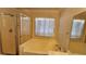 Bathroom featuring a soaking tub and glass shower enclosure at 2707 Gardenia Flower Ave, North Las Vegas, NV 89031