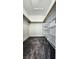 Spacious walk-in closet with custom shelving and carpet at 2707 Gardenia Flower Ave, North Las Vegas, NV 89031