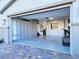 Spacious garage with epoxy flooring and built-in storage cabinets for organization at 288 Whitney Crest St, Henderson, NV 89015