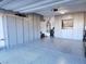 Organized garage featuring epoxy flooring, built-in cabinets, and ample storage space at 288 Whitney Crest St, Henderson, NV 89015