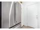 Modern kitchen shows stainless refrigerator and white pantry door at 288 Whitney Crest St, Henderson, NV 89015