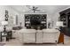 Cozy living room featuring a large entertainment center and a comfortable seating arrangement at 288 Whitney Crest St, Henderson, NV 89015