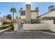 Exterior view showcasing patio and lush landscaping, creating a private outdoor retreat at 3484 Nightflower Ln # B, Las Vegas, NV 89121
