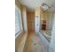 Luxurious bathroom features a walk-in shower and soaking tub surrounded by travertine tiles at 3580 Prairie Ave, Pahrump, NV 89048