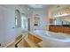 Luxurious bathroom with soaking tub and vanity at 3580 Prairie Ave, Pahrump, NV 89048