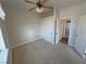 Bedroom featuring carpet, a ceiling fan, and a sliding door closet at 3580 Prairie Ave, Pahrump, NV 89048