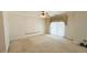 Spacious bedroom with carpet flooring and a ceiling fan at 3580 Prairie Ave, Pahrump, NV 89048