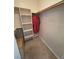 Walk-in closet with custom shelving and hanging space for organized storage at 3580 Prairie Ave, Pahrump, NV 89048