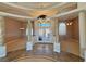 Elegant foyer features decorative columns and glass doors, showcasing sophisticated design at 3580 Prairie Ave, Pahrump, NV 89048
