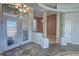 Inviting foyer boasts decorative columns and glass doors, creating a grand entrance at 3580 Prairie Ave, Pahrump, NV 89048