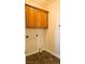 Laundry room with cabinets, tile floors, and hookups at 3580 Prairie Ave, Pahrump, NV 89048