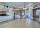 Open concept living room with tile floors, high ceilings, decorative pillars, and a grand entrance at 3580 Prairie Ave, Pahrump, NV 89048
