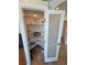 A view of the pantry, showing shelving and storage at 3580 Prairie Ave, Pahrump, NV 89048
