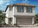 Charming two-story home features a stucco exterior, tile roof, and a two-car garage at 3871 Riley Rose Ave, Las Vegas, NV 89139