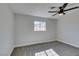 Bedroom featuring neutral carpet, ceiling fan, fresh paint, and natural light at 4360 El Tovar Rd, Las Vegas, NV 89115