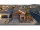 Aerial shot of a home's exterior showing the desert landscaping and large driveway at 437 Via Stretto Ave, Henderson, NV 89011