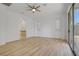 Versatile bonus room with a patio entrance and view of the tiled bathroom at 437 Via Stretto Ave, Henderson, NV 89011