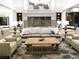 Comfortable lounge area with a fireplace, sofa, chairs, and stylish decor at 437 Via Stretto Ave, Henderson, NV 89011