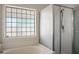 Modern bathroom showcasing a glass-enclosed shower and tiled tub at 4529 Gracemont Ave, Las Vegas, NV 89139
