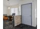 Inviting home entryway with dark marble floors, office space and a well-lit front door at 4529 Gracemont Ave, Las Vegas, NV 89139