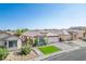 Lovely single-story home showcasing a two-car garage, vibrant green lawn, and verdant landscaping at 4529 Gracemont Ave, Las Vegas, NV 89139