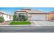Charming single-story home featuring a two-car garage, well-maintained lawn, and neatly trimmed landscaping at 4529 Gracemont Ave, Las Vegas, NV 89139