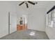 Well-lit bedroom with neutral carpet and entry doorway offering a versatile and inviting space at 4624 Windy Hollow St, Las Vegas, NV 89130