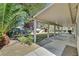 Relaxing covered patio overlooking spacious backyard provides an ideal outdoor living area at 4624 Windy Hollow St, Las Vegas, NV 89130