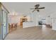 Inviting space featuring an open layout, vinyl flooring, and sliding glass doors at 4624 Windy Hollow St, Las Vegas, NV 89130