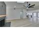 Bright and open living room leads to modern kitchen and dining areas at 5151 Tennis Ct, Las Vegas, NV 89120