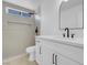This bathroom is furnished with a walk-in shower, a built-in mirror, and modern fixtures at 5264 Silverheart Ave, Las Vegas, NV 89142