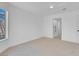 Bright bedroom with white walls, neutral carpet and light-filled windows at 5264 Silverheart Ave, Las Vegas, NV 89142