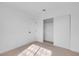 Carpeted bedroom with closet featuring sliding doors and white trim at 5264 Silverheart Ave, Las Vegas, NV 89142