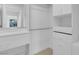 Walk-in closet with custom built-ins and vanity, offering ample storage and organization at 5264 Silverheart Ave, Las Vegas, NV 89142