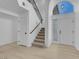 Elegant foyer with staircase and high ceilings, creating a grand entrance at 5264 Silverheart Ave, Las Vegas, NV 89142
