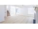 Bright living room with fireplace and hardwood floors, offering ample natural light at 5264 Silverheart Ave, Las Vegas, NV 89142