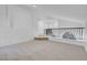 Bright loft area with plush carpet and black railing, offering a versatile living space at 5264 Silverheart Ave, Las Vegas, NV 89142