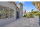 Spacious outdoor patio surrounded by a lush green landscape at 5264 Silverheart Ave, Las Vegas, NV 89142