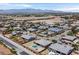 Expansive neighborhood aerial view highlighting well-maintained homes, desert landscaping, and the serene mountain backdrop at 5801 Exbury Gardens Ct, Las Vegas, NV 89118