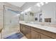 Modern bathroom featuring a frameless glass shower, double sinks, and stylish tile work at 5801 Exbury Gardens Ct, Las Vegas, NV 89118