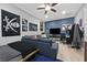 A multipurpose room is shown with cool decor and contemporary wood floors at 5801 Exbury Gardens Ct, Las Vegas, NV 89118