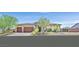 Charming single-story home with a well-maintained yard and a spacious three-car garage at 5801 Exbury Gardens Ct, Las Vegas, NV 89118
